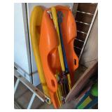 Lot of Water Sports Equipment Including Sleds, Skis, Paddles, and Skateboard