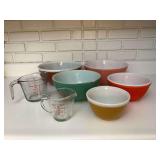 Assorted Pyrex Mixing Bowls and Glass Measuring Cups