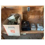 Assorted Telephones, Battery Charger, and Electrical Enclosures