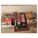 Large Assortment of Jigsaw Puzzles in Containers