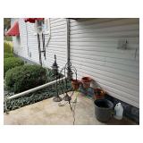 Assorted Patio and Garden Decor Collection including Wind Chime, Planters, and Stands