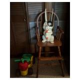 Wooden Rabbit Sculpture, Wooden High Chair, and Plastic Riding Toy