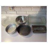 Assorted Bakeware Lot Featuring Pyrex, Fire-King, Wilton, and Metal Pans