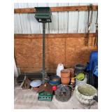 Assorted Garden and Yard Decor Including Terrarium, Planters, and Bird Feeders