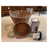Household Assortment featuring Woven Baskets, Glass Jar, Steam Iron, and Rubbermaid Ironing Organizer