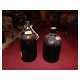 (2) Amber Glass Rendezvous Camp Bottles