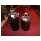 (2) Amber Glass Rendezvous Camp Bottles