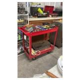 Metal rolling shop cart full of tools