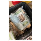Bin full of household items