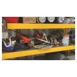 Shelf full of power tools and auto