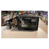 Battery Charger & Box Of Auto Gauges