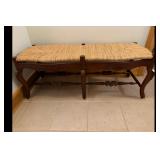 Brown Wooden Bench with Woven Seat