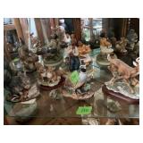 Wild life and old man and woman Statue