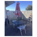 Table and Chairs and umbrella 36" x 36"