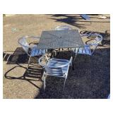Wrought iron table 36"x36" w/4 aluminum chairs