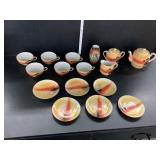 Ornate Cups Saucers, tea pot, sugar creamer