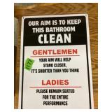 Our aim is to keep this bathroom clean Sign