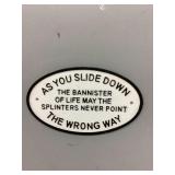 Cast iron sign 10 1/2" wide