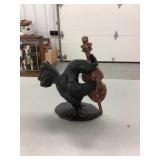 Cast iron chello playing rooster
