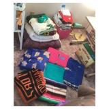 Throw Blankets, sleeping bag & some T-shirts