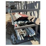 Misc metal trim, ridge cap, and gutter down spout