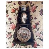 Ceramic Vessels and Decorative Plate on Wooden Shelf