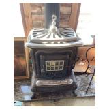 Cast Iron Parlor Stove with Flue Buyer Responsible to take apart & plug hole