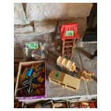 Toy Collection with Figures, Oregon Trail Wagon, and Other Toy Components