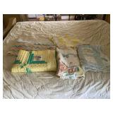 Child’s quilts/blankets & twin bed ruffle (stains)