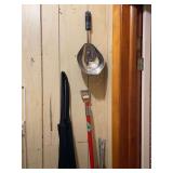 Household Items Including Apron, Mop, Shelf, and Strainer