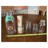 Assorted Glass Bottles with Advertising Inserts