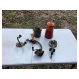 Cast Metal Items Including a Food Cutter, Can, and Candle Holders