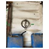 Collection of Farm Tools and Kerosene Containers