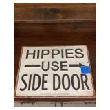 Hippies use side door sign