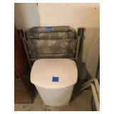 Trash can and chair