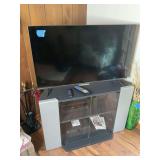 Hisense flat screen tv 43” and cabinet
