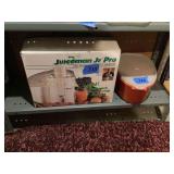 The Juiceman Jr. Pro Electronic Juicer with Kitchen Utensil Container