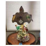 Porcelain Figural Lamp with Floral Accents