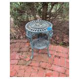 Cast Metal Round Accent Table with Lower Shelf
