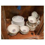 Content of shelf in China cabinet