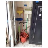 Cleaning Tools Lot Including Brooms, Mops, Bucket, and Extension Cord