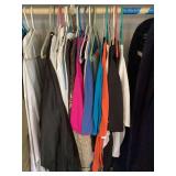 Assorted Clothing Items on Hangers