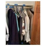 Assorted Clothing Items on Hangers