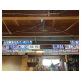 Collection of Illinois License Plates Mounted on Rafters