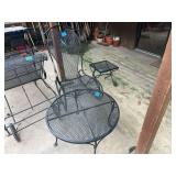 Black Metal Patio Furniture Set with Round Table, Rocking Chair, and Side Table