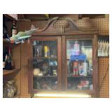 Wall-Mounted Wooden Display Cabinet with Assorted Household Maintenance Supplies