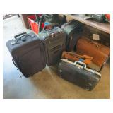 Collection of Assorted Travel Luggage and Cases