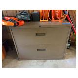 Two-Drawer Metal Filing Cabinet with Assorted Tools and Supplies