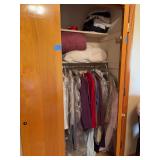 Assorted Clothing and Textiles in Closet Storage