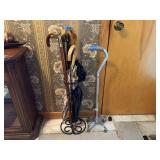 Assorted Walking Sticks, Umbrellas, and Quad Cane in Metal Stand
